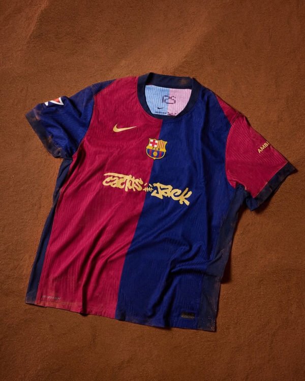 Limited edition FC Barcelona x Travis Scott 2024/25 home jersey featuring Blaugrana stripes, Cactus Jack logo, and Nike Dri-FIT fabric – exclusive football and streetwear collaboration