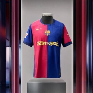 Limited edition FC Barcelona x Travis Scott 2024/25 home jersey featuring Blaugrana stripes, Cactus Jack logo, and Nike Dri-FIT fabric – exclusive football and streetwear collaboration
