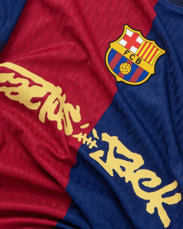 Limited edition FC Barcelona x Travis Scott 2024/25 home jersey featuring Blaugrana stripes, Cactus Jack logo, and Nike Dri-FIT fabric – exclusive football and streetwear collaboration